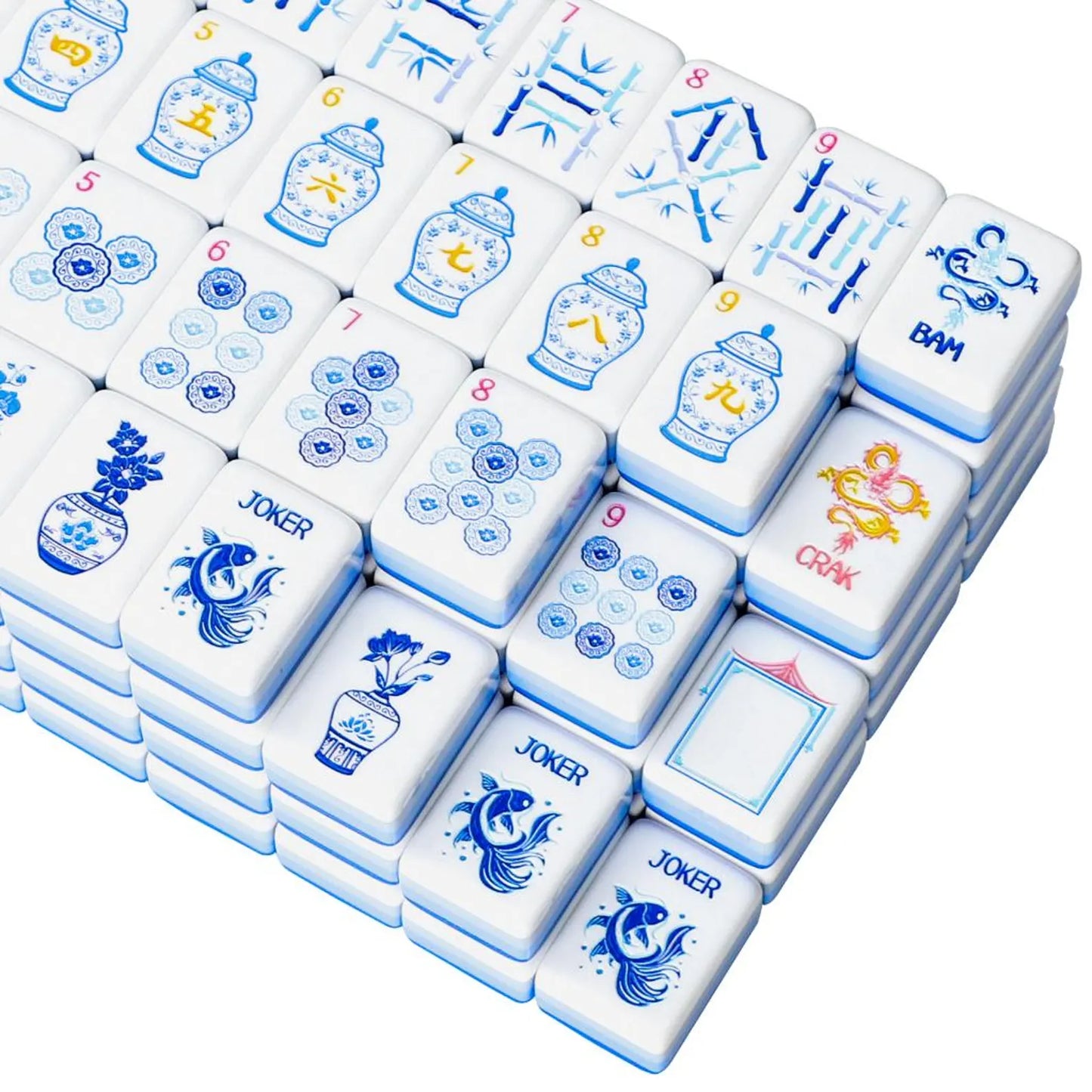 Close-up corner view of stacked porcelain style Mahjong tiles showcasing koi fish jokers, blue medallion dots, and gold dragon tiles.