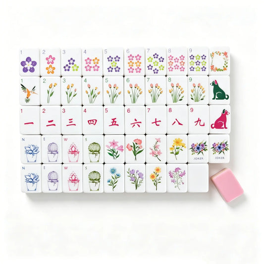 A close-up jumbled view of the Botanical Backyard American Mahjong tiles from the second image, highlighting the solid sage green and pastel pink layered sandwich core alongside hand-painted tulip and flower details.